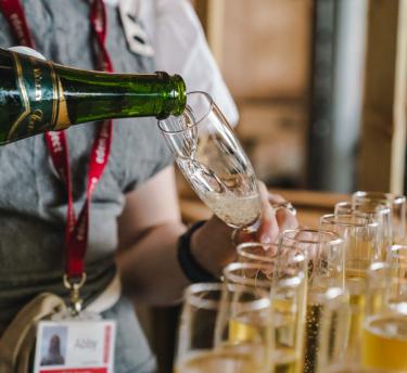 Champagne being poured in a glass
